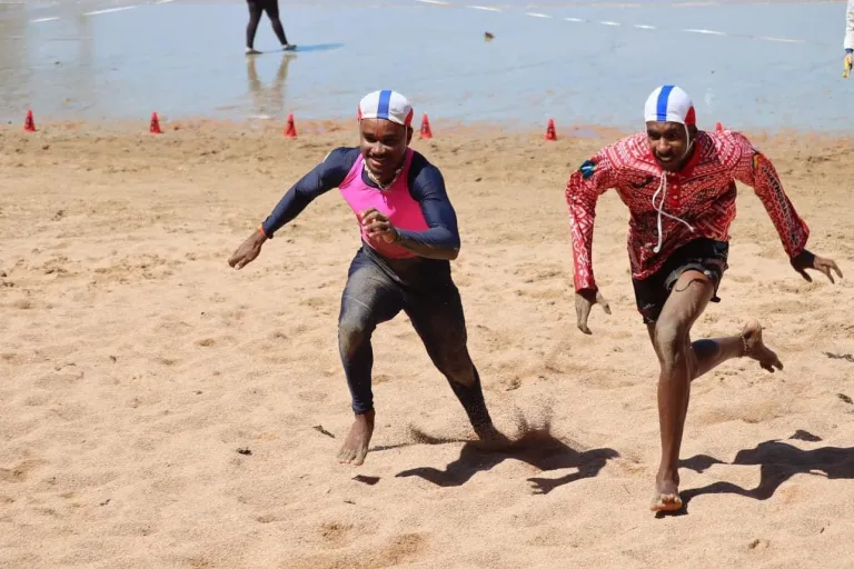 Evandah-and-team-mate-Steven-Dau-battling-it-out-in-the-open-beach-flags-event
